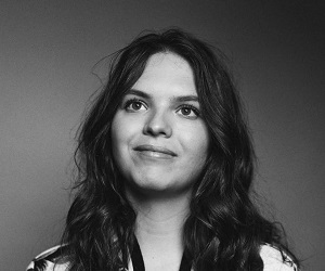 photograph of a woman smiling